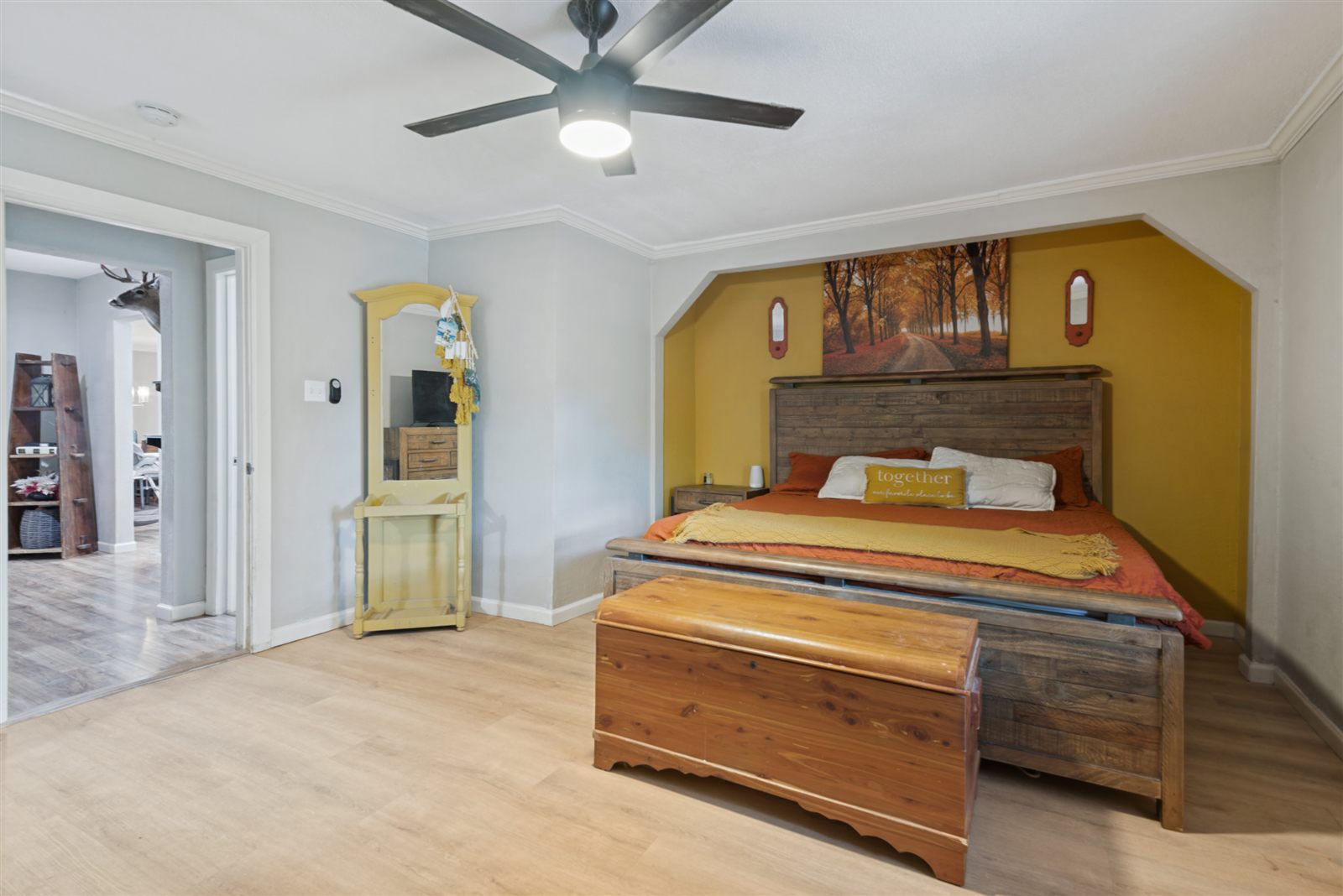 Primary bedroom with ceiling fan